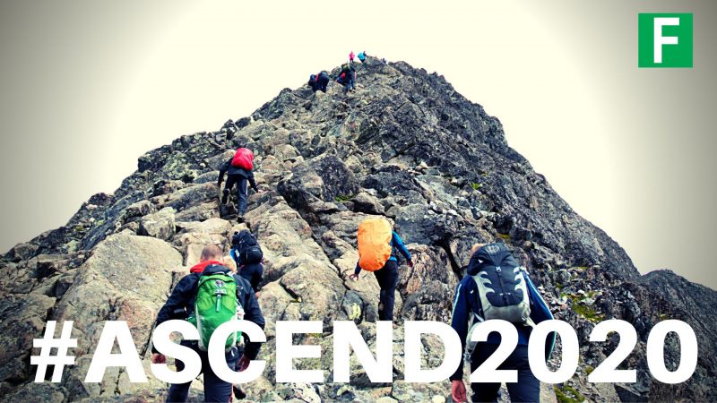 people climbing a mountain with the words ascend2020